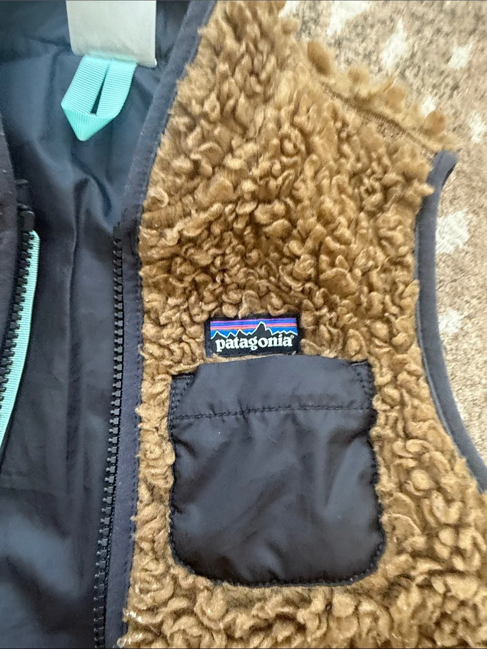 Patagonia Brown Sherpa Fleece Vest with Teal Accents